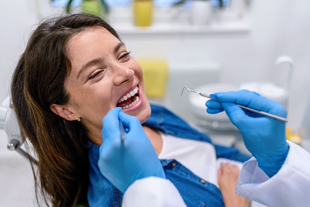 smiling patient at Memphis dentist appointment